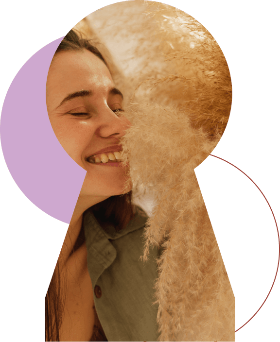 About integrative wellness care in tempe, AZ Smiling woman enjoying a serene moment, symbolizing wellness and positive energy promoted by Gateway Health Wellness and Aesthetics.