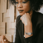 Tips for Choosing the Ideal Aesthetic Treatment for You Woman thoughtfully considering aesthetic treatment options.